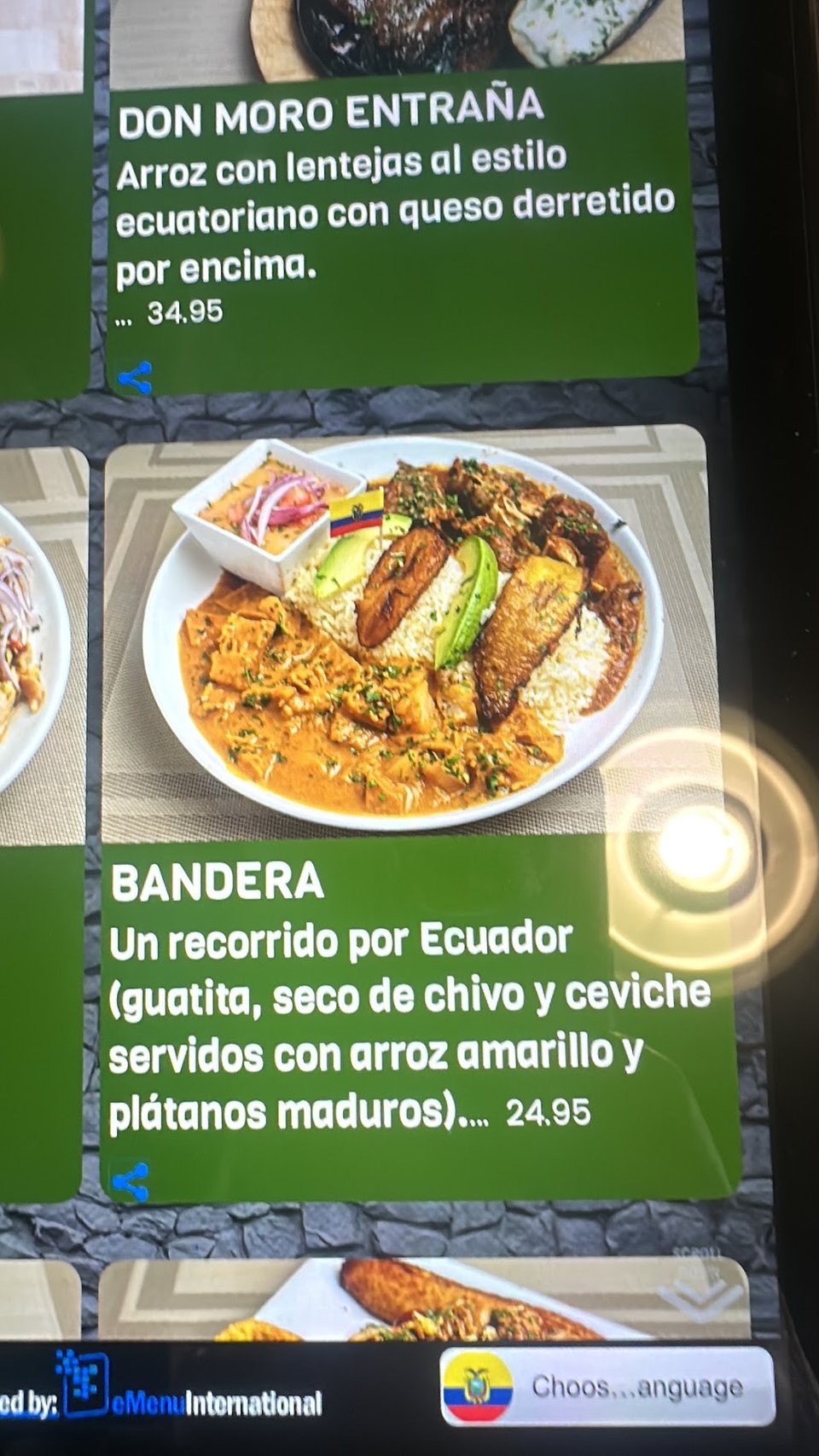 Restaurant menu showing bolones, crabs, and ceviche.